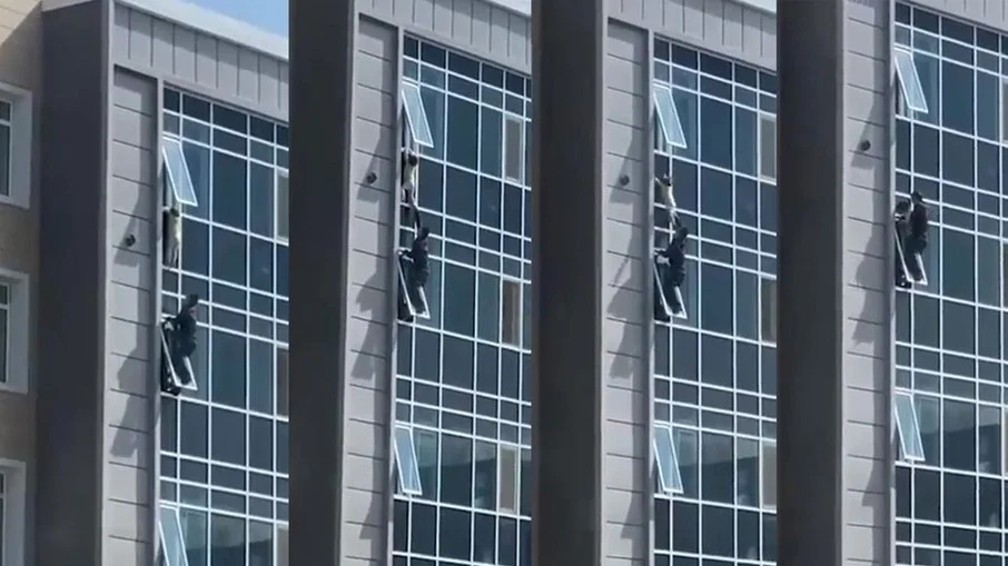 VÍDEO: homem salva criança pendurada na janela do 8º andar